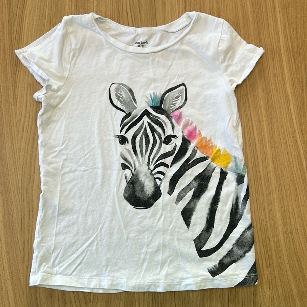 Carter’s white shirt with zebra